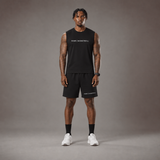 Model wearing the RAWS Off-Court Tank Top and Shorts in Black, front view