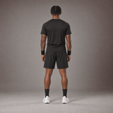 Model wearing the RAWS Basketball Shooting T-Shirt in Black with Headband, Sweatbands and Shooting Shorts, back view