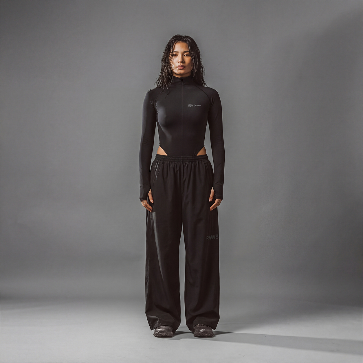 RAWS Women's Zip Bodysuit - Black | Women's Performance Activewear