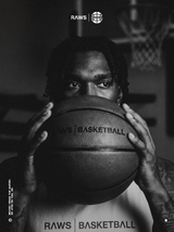 RAWS Basketball player holding a RAWS basketball
